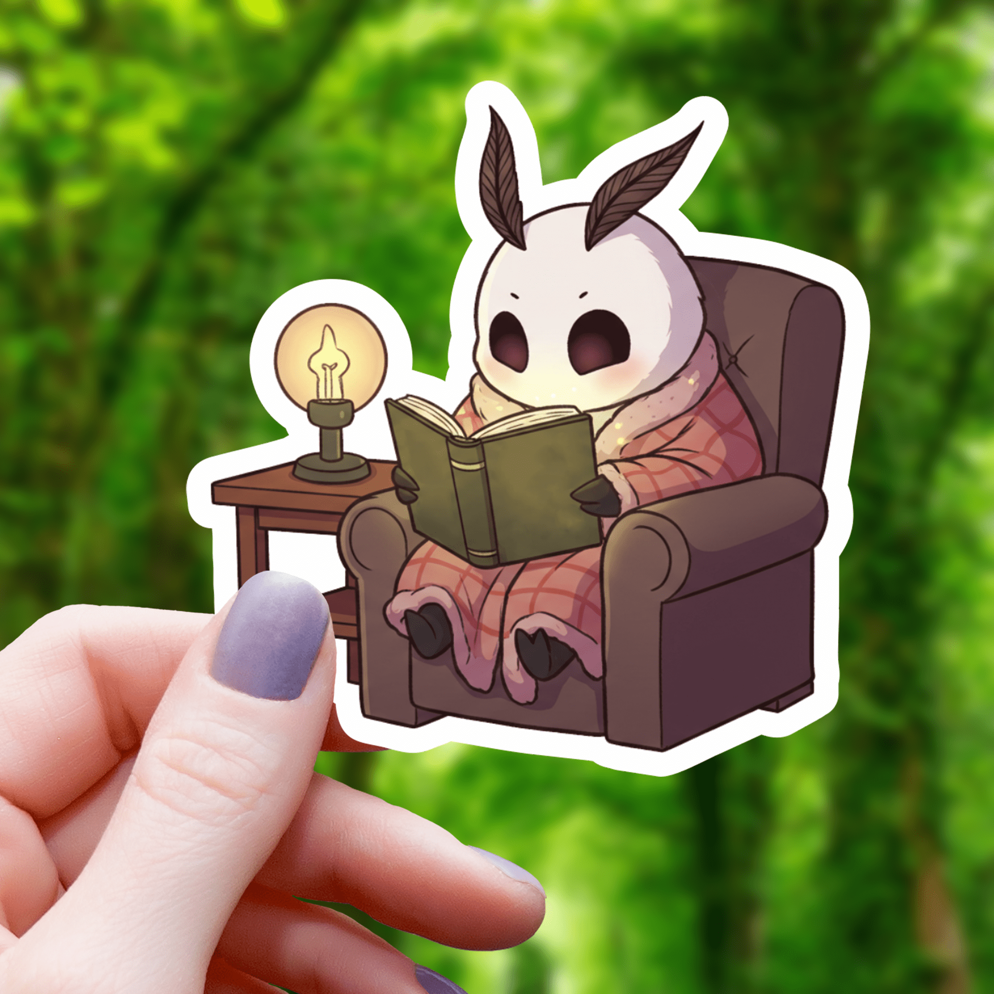Mothman Reading A Book Recliner Sticker - Monster Stuff Store